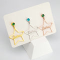 Personalised stainless steel star earrings with engraved name and birthstone crystal – elegant celestial jewellery gift for her.
