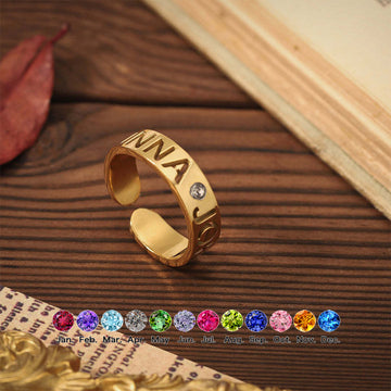 Personalised birthstone name ring in gold with engraved letters and adjustable open band – custom gift for her.