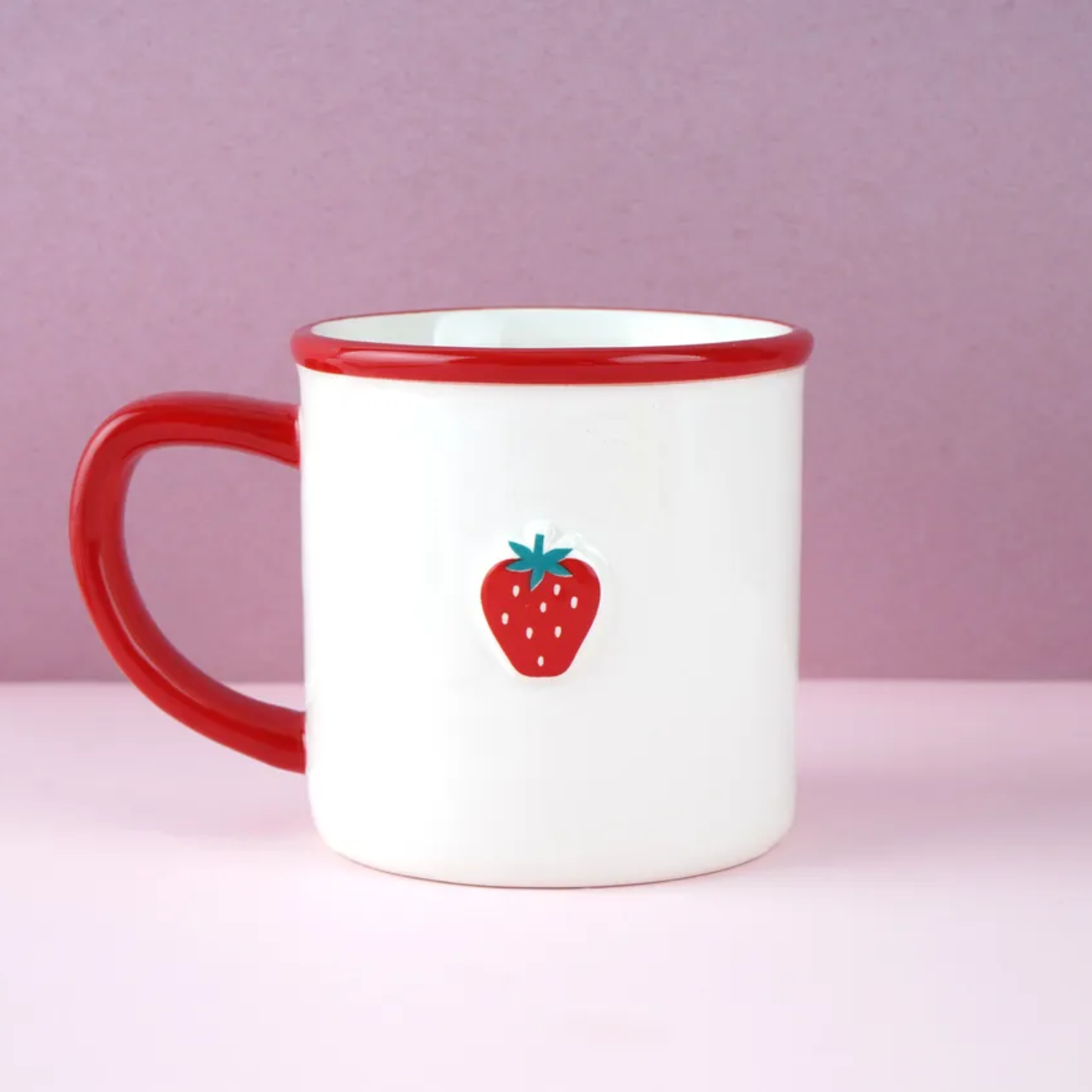 Strawberry Fields Coffee Mug with red handle and rim, embossed strawberry design on white stoneware, comes in coloured gift box.