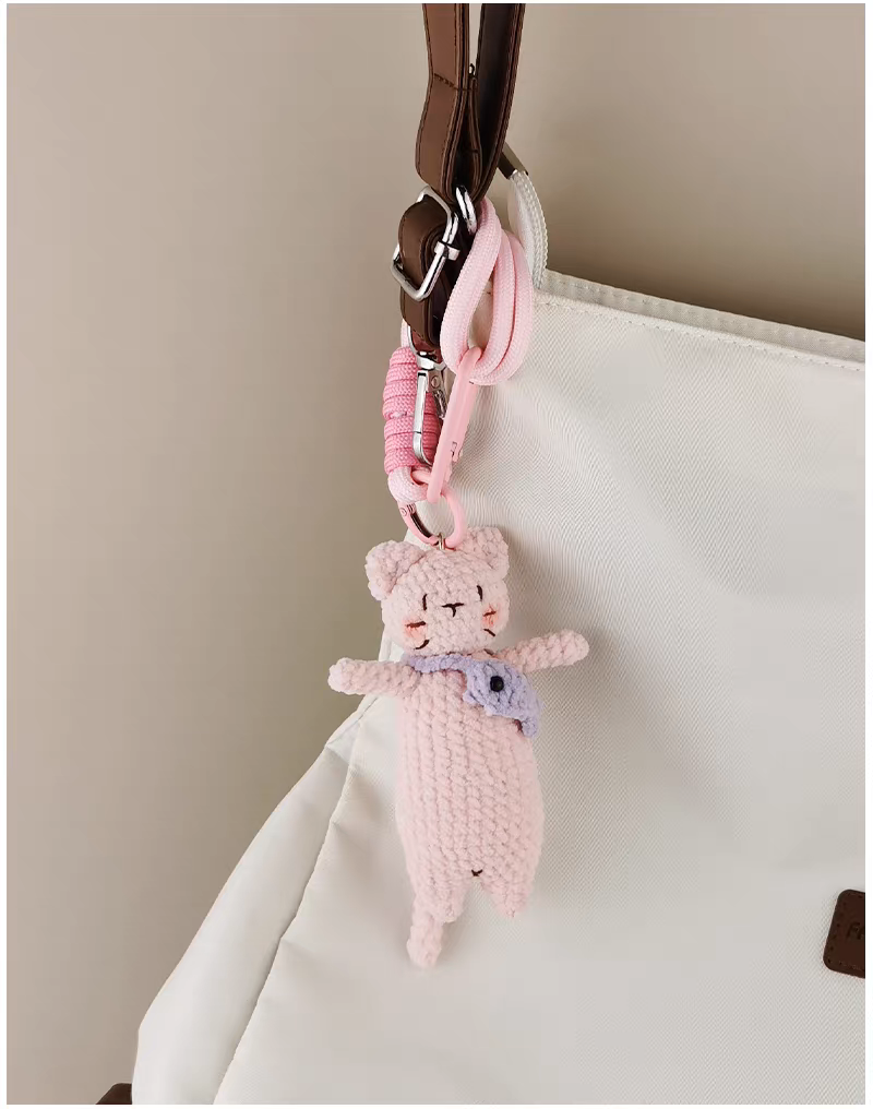 handmade crochet pink kitty keychain hugging fish
