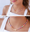 Woman wearing colourful name bead necklace – personalised everyday jewellery