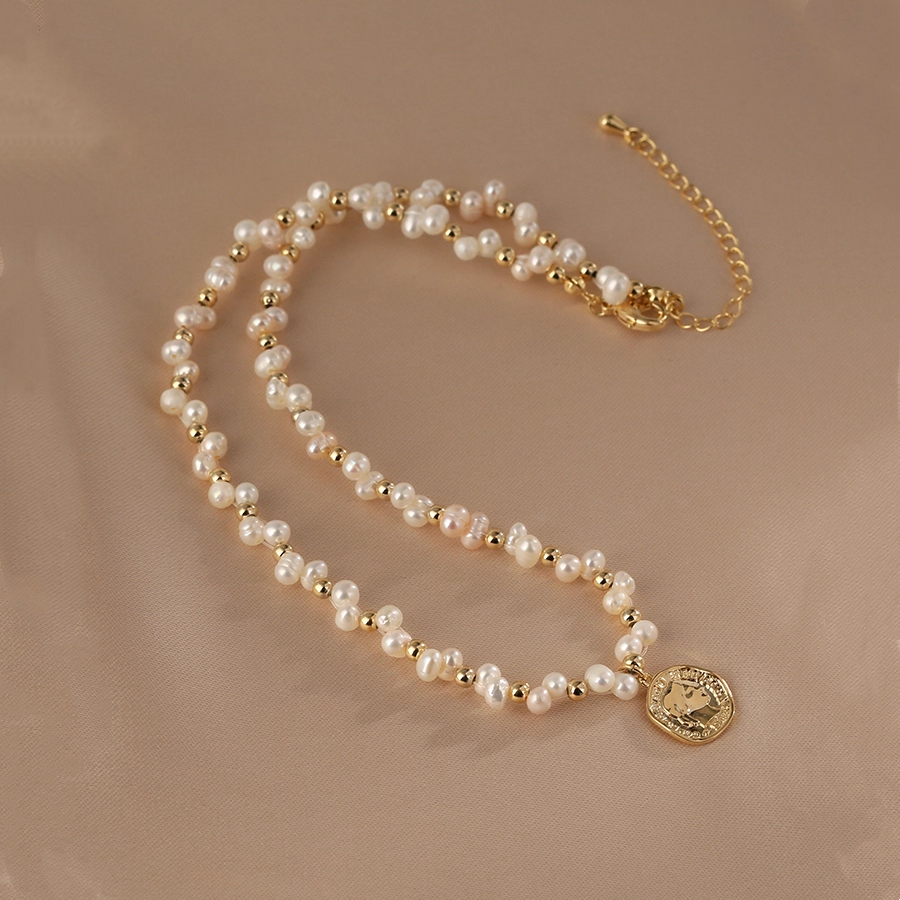 Handmade pearl necklace with 14K gold-plated medallion pendant