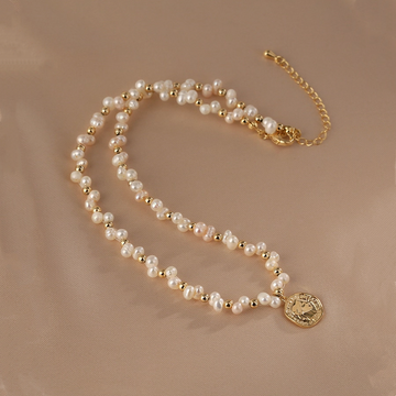 Handmade pearl necklace with 14K gold-plated medallion pendant