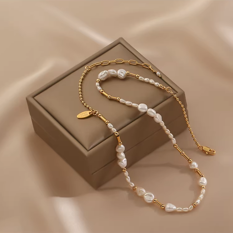 Handmade freshwater pearl necklace in S925 sterling silver on beige background