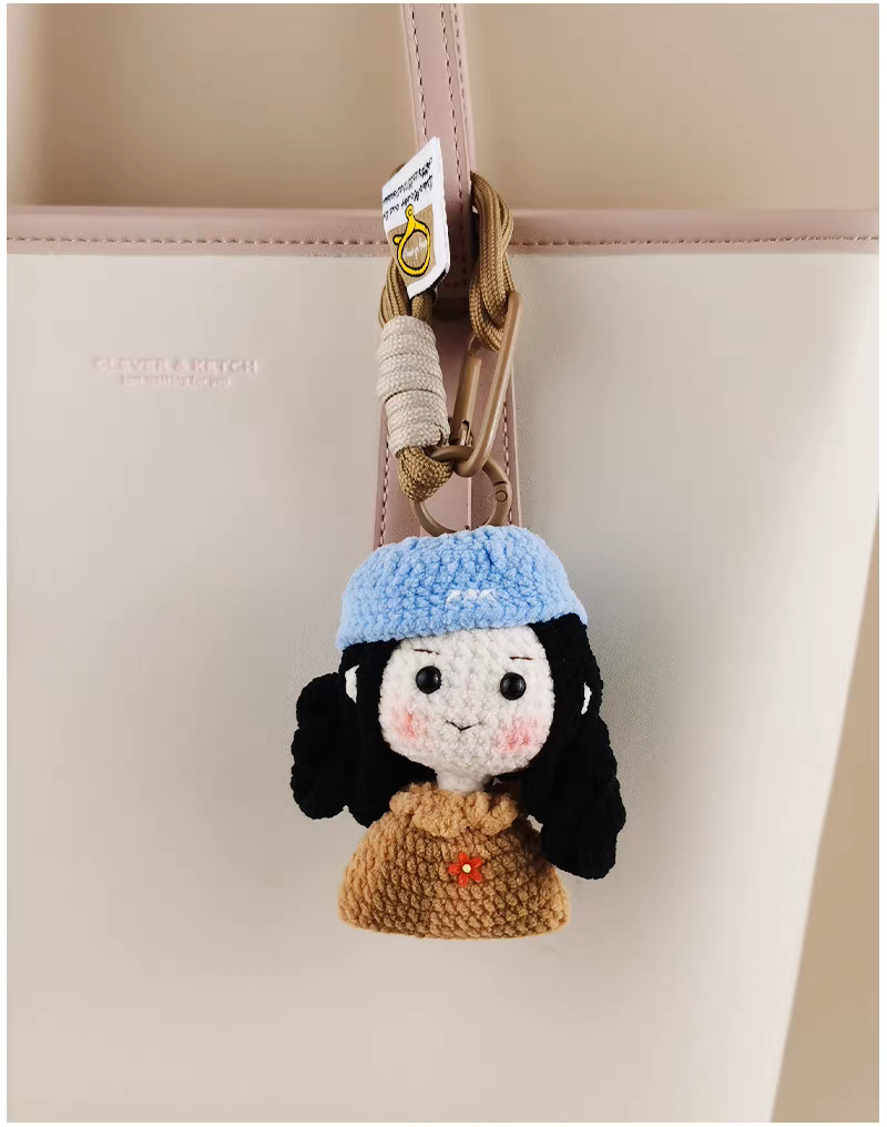 handmade crochet sailor girl keychain with blue hat
