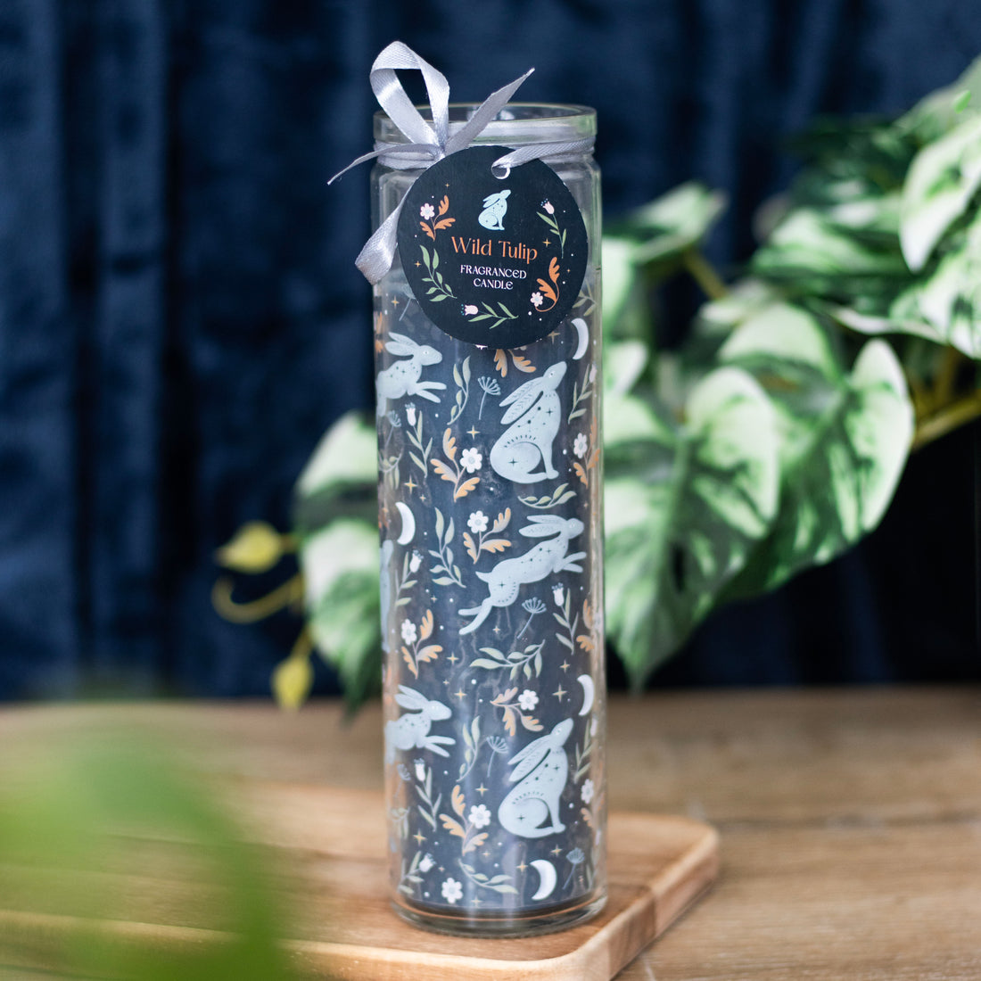 Tall Midnight Hare Wild Tulip tube candle with moon and hare illustration – long burn art-inspired home fragrance.