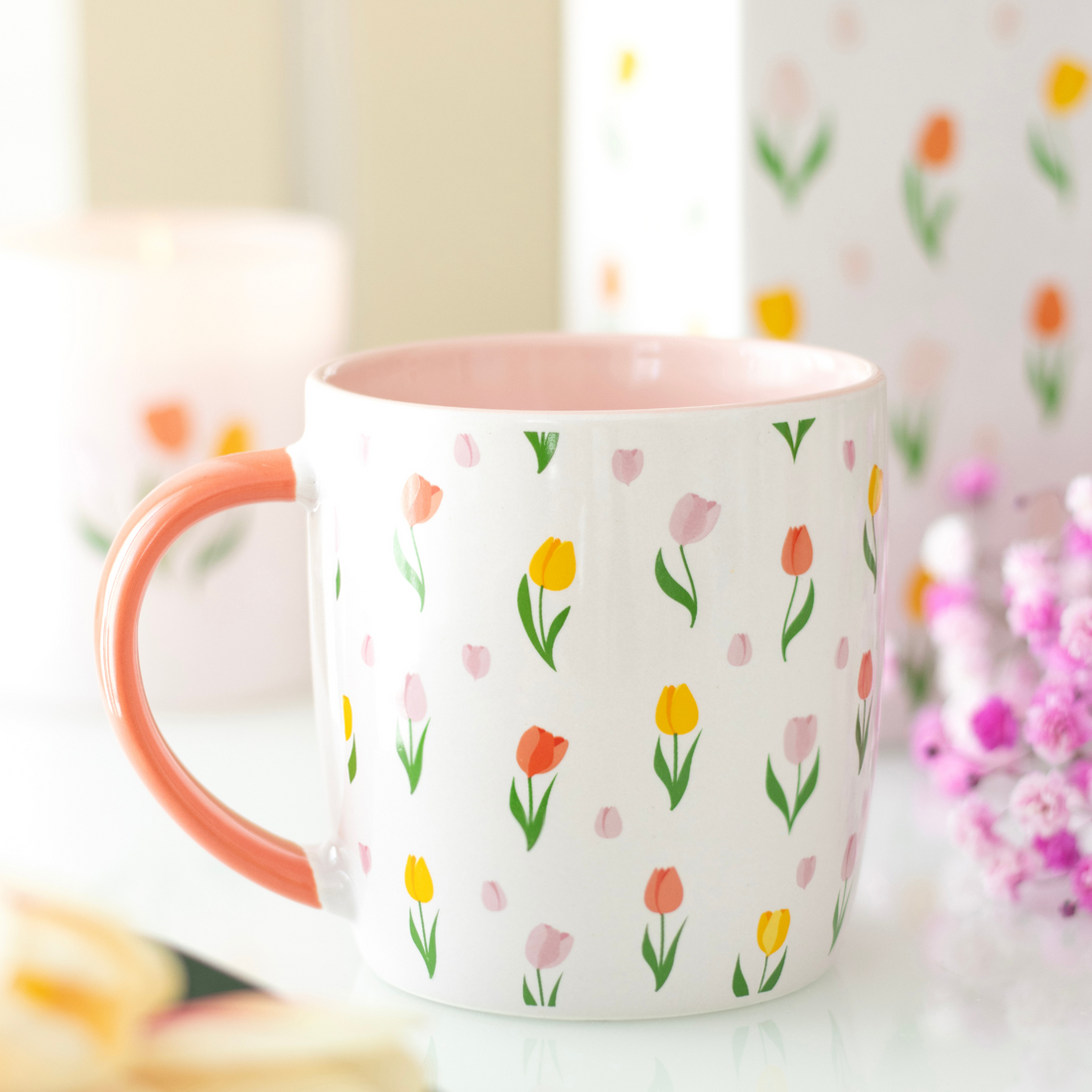 White ceramic mug with pink tulip print and pink interior — perfect floral gift for Mother’s Day or birthdays.