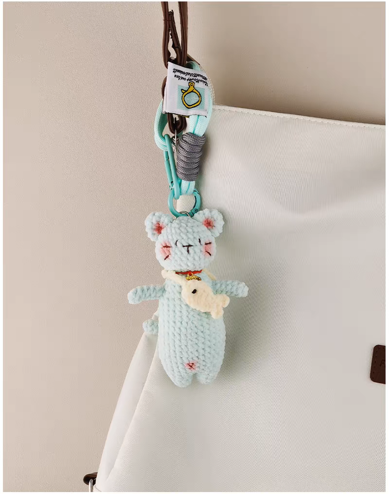 handmade crochet blue cat keychain hugging fish
