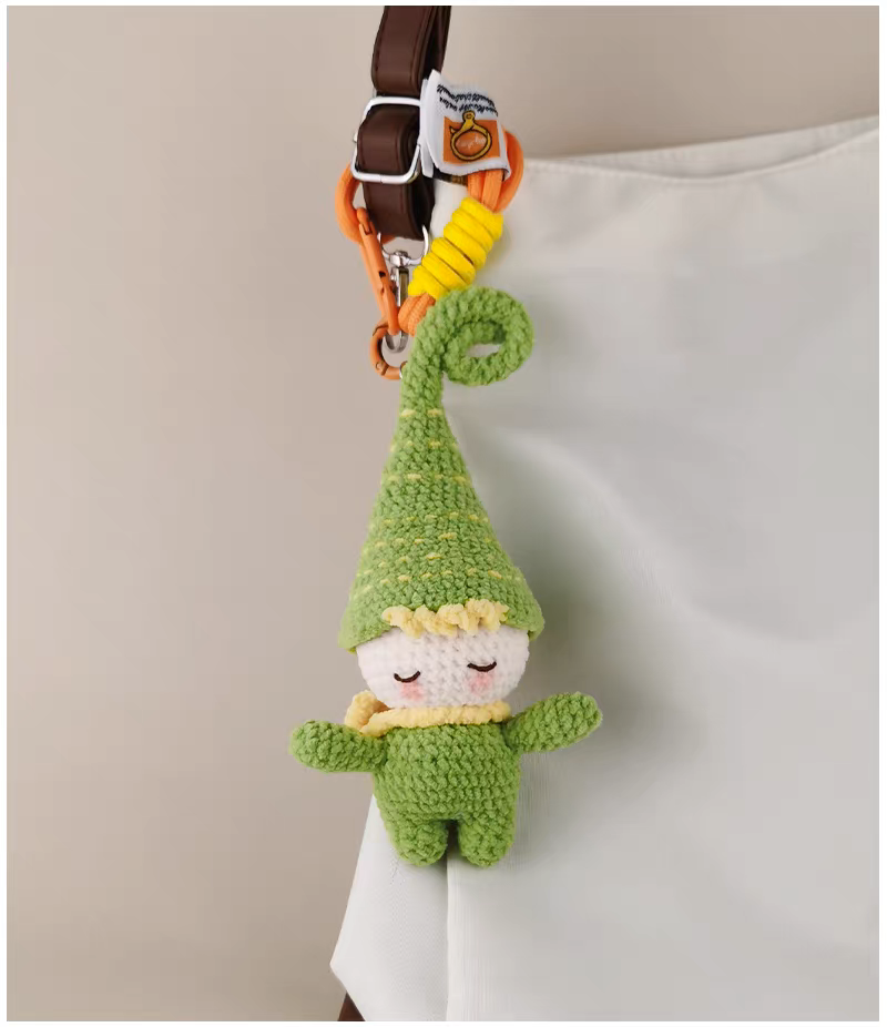 handmade crochet forest elf keychain in green
