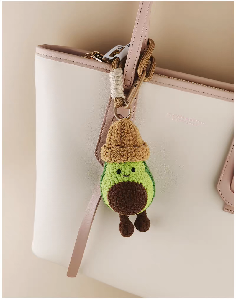 Handmade crochet avocado keychain with brown hat