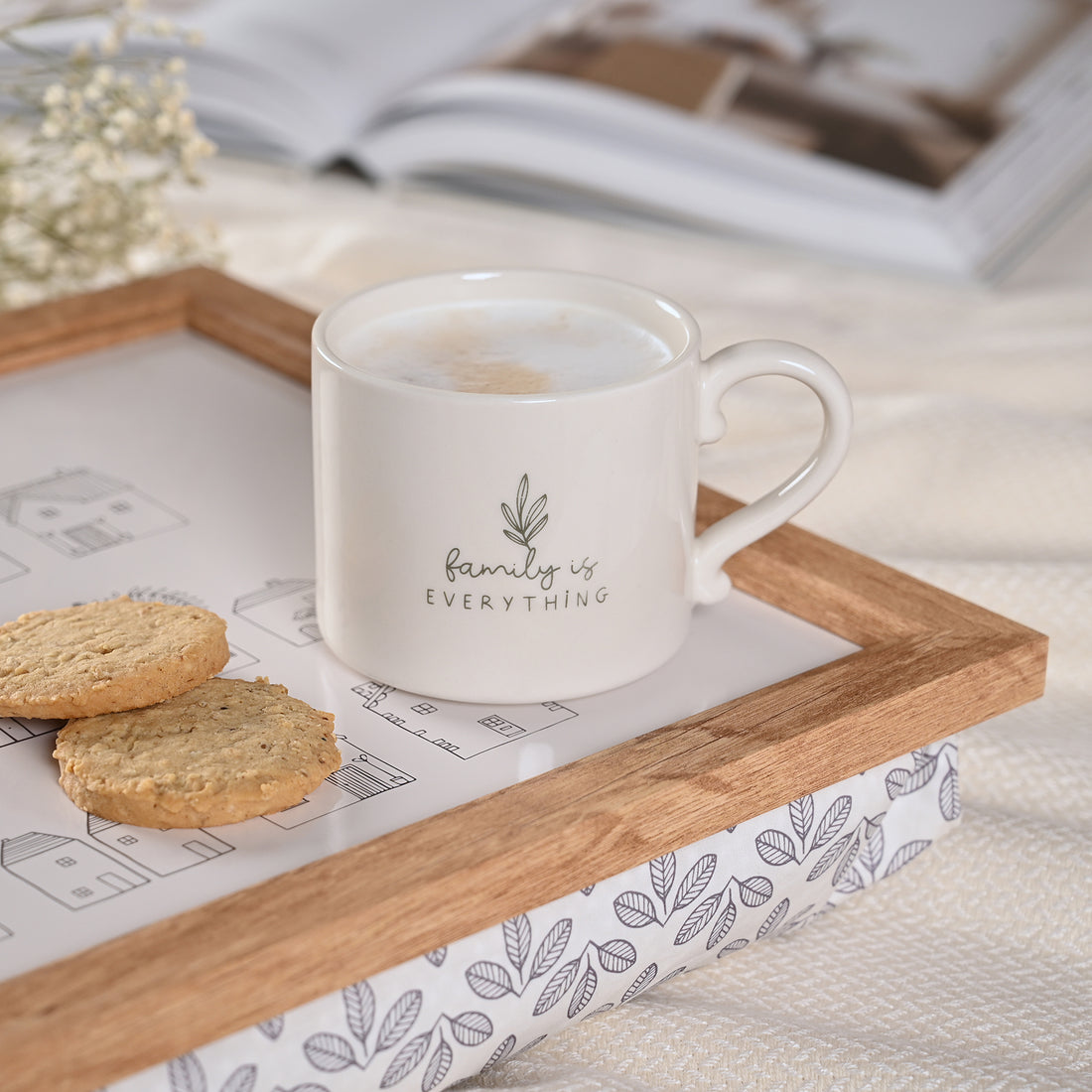 Ivory ceramic mug with “Family is Everything” quote and leaf design — minimalist family-themed gift mug in presentation box.