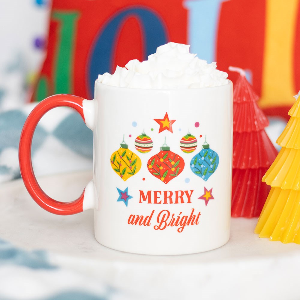 Merry and Bright Christmas ceramic mug with red handle and festive bauble design, boxed and ready to gift.