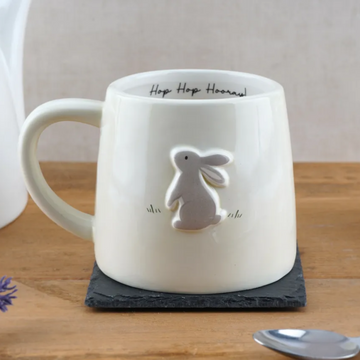 Cream ceramic bunny mug with “Hop Hop Hooray” text inside — cute Easter or spring gift mug in decorative gift box.