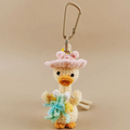 handmade crochet duck keychain with straw hat
