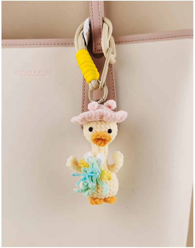 handmade crochet duck keychain with straw hat

