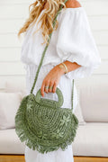 Woman holding khaki woven straw tote bag – handwoven women’s bag and gift for her