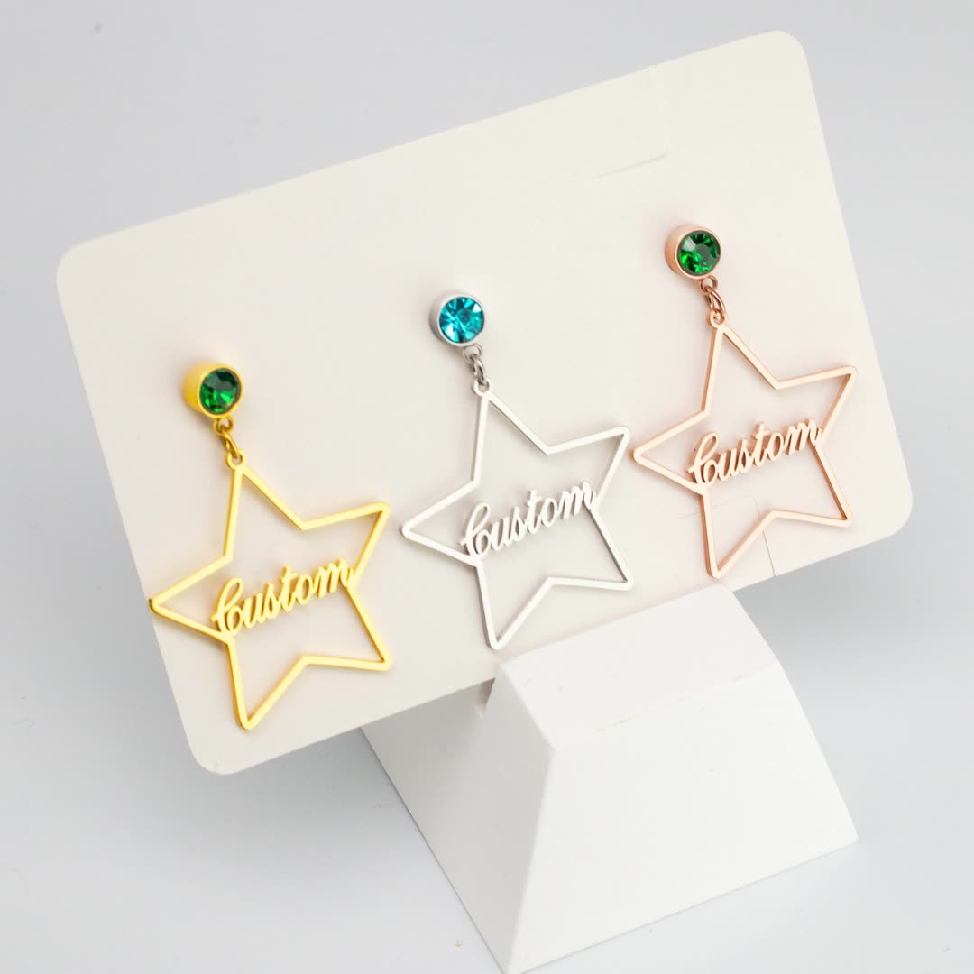 Personalised stainless steel star earrings with engraved name and birthstone crystal – elegant celestial jewellery gift for her.