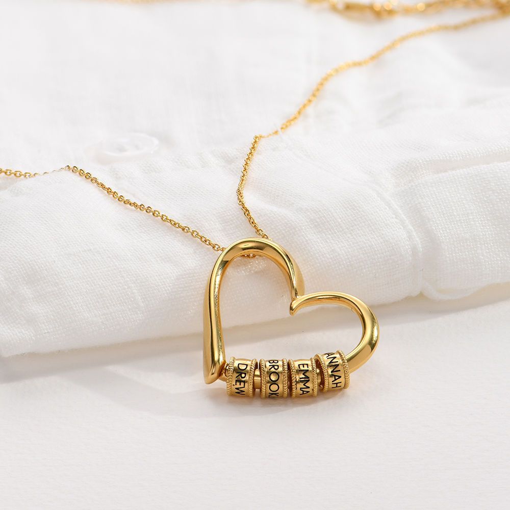 Close-up of name beads on heart pendant – engraved custom necklace for her