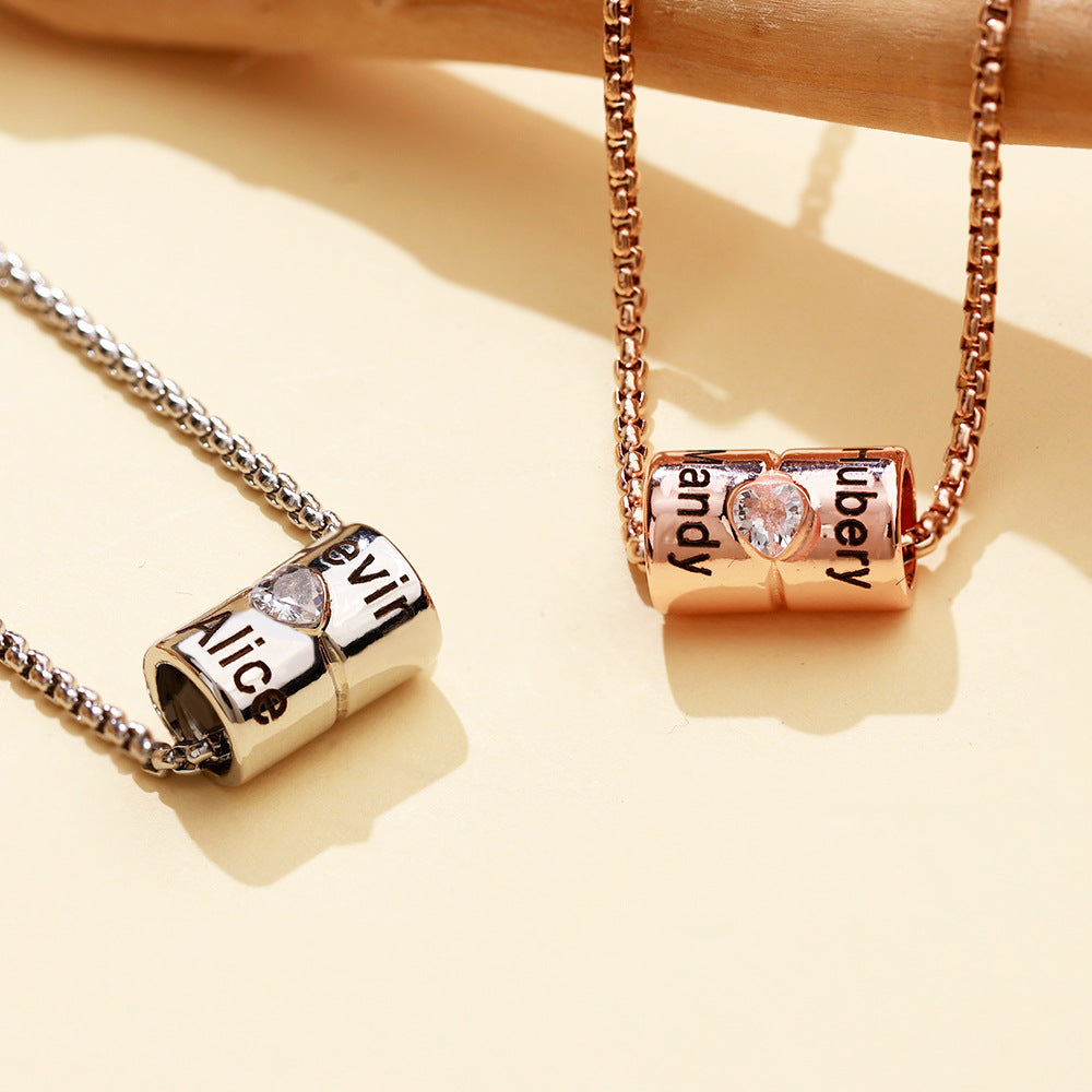 Personalised cylinder necklace with engraved names and crystal