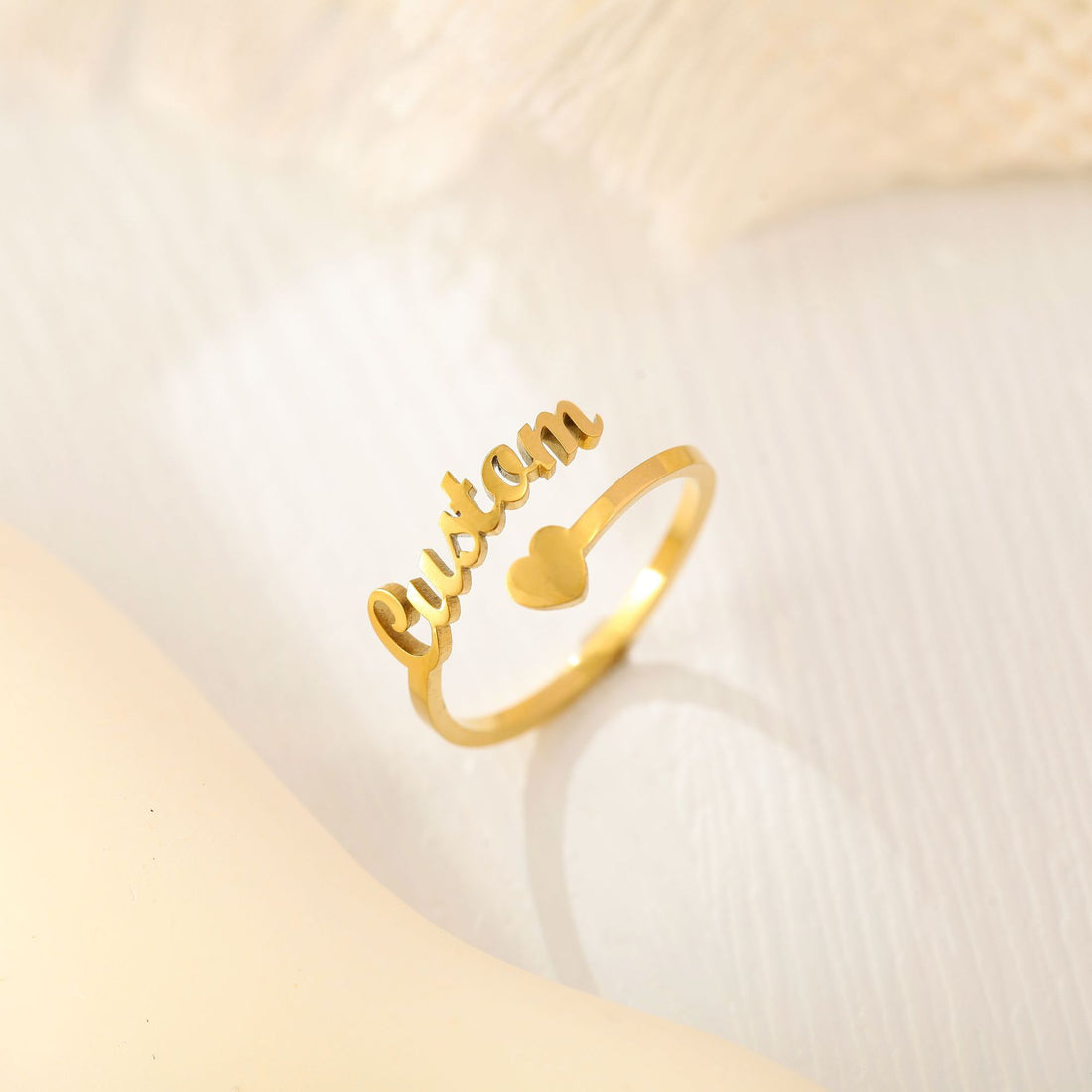 Personalised gold name ring with heart accent – adjustable engraved jewellery gift for her.