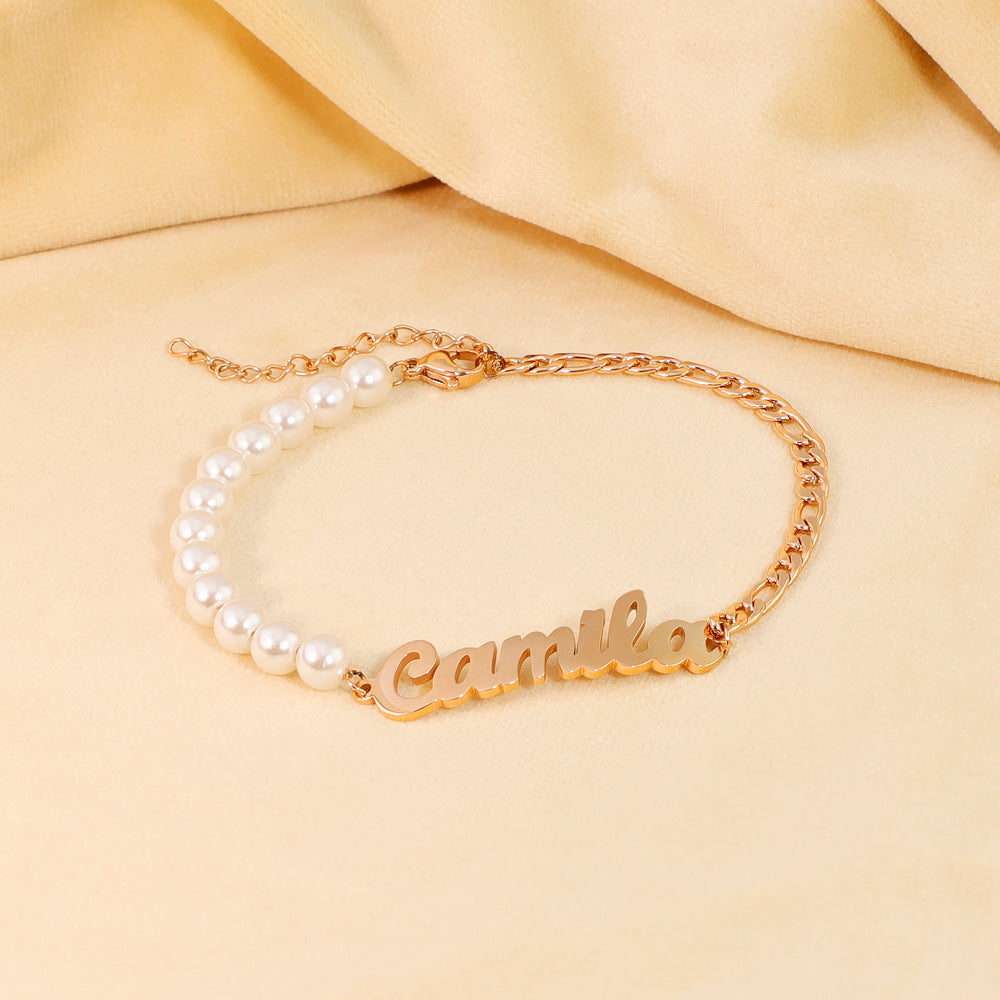 Personalised name bracelet with pearl and chain design in gold