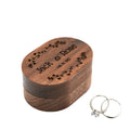 Oval walnut ring box with custom engraved names and floral design