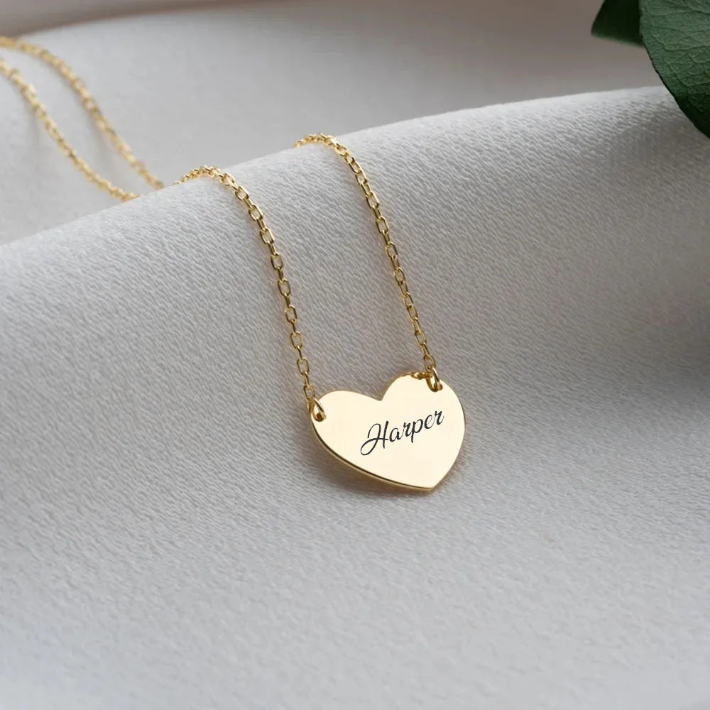 Gold personalised heart necklace with engraved name on pendant