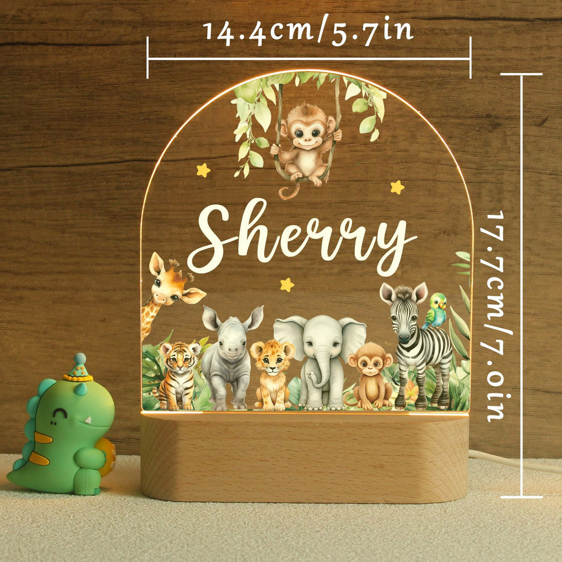 personalised safari night light with custom name and jungle animals on wooden base for kids nursery décor