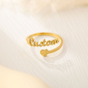 Personalised gold name ring with heart accent – adjustable engraved jewellery gift for her.
