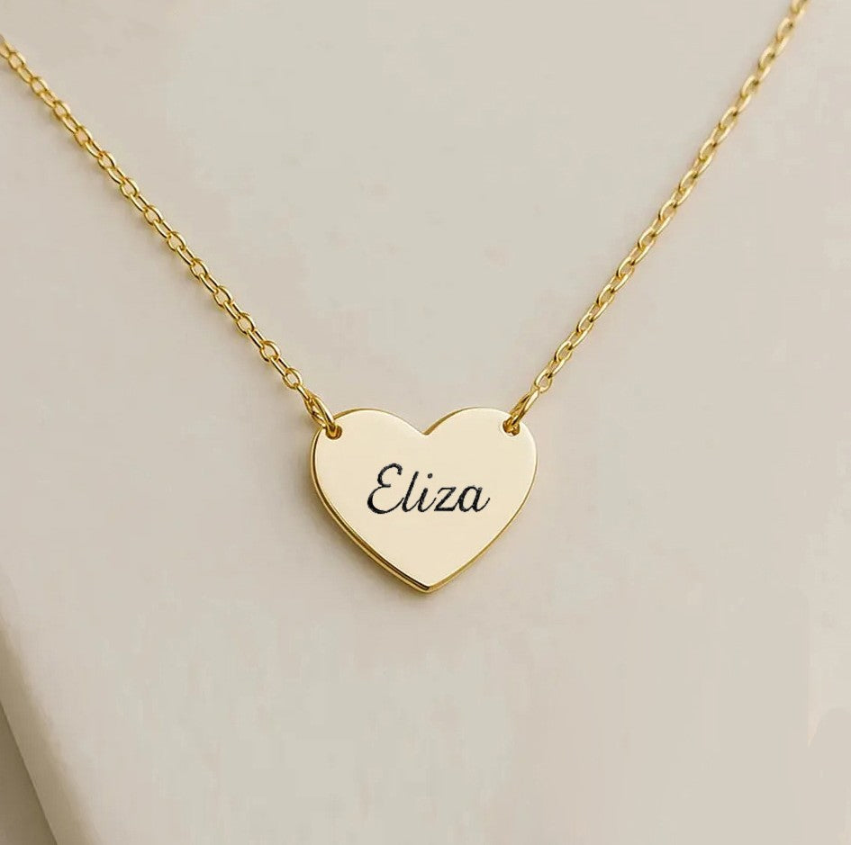 Gold personalised heart necklace with engraved name on pendant