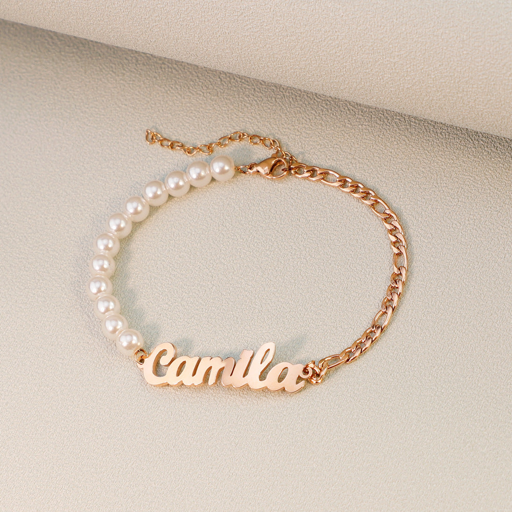 Personalised name bracelet with pearl and chain design in gold