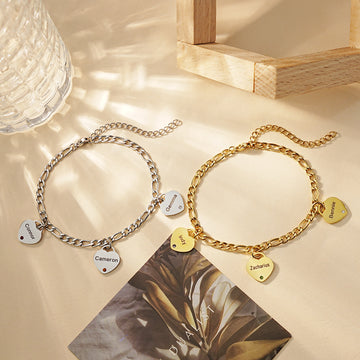 Custom heart tag bracelet in gold and silver with engraving and birthstone option