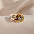 Close-up of interlocking rings with custom name engraving