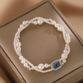 Handmade double layer freshwater pearl bracelet with blue geometric stone
